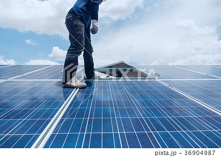 engineer team working on replacement solar panel 36904987