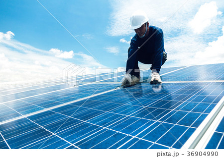 engineer team working on replacement solar panel 36904990