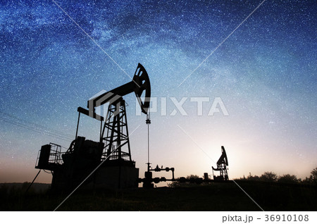 Oil pump on the oil field in the night Oil pump on the oil field in the night 36910108