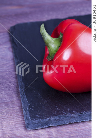 Red pepper on a stone tray 36910401