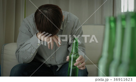 man with alcoholism 36911623