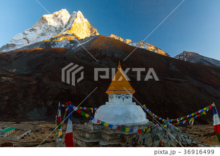 Buddhist stupa on mountain trekking path in 36916499