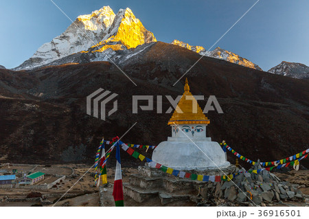 Buddhist stupa on mountain trekking path in 36916501