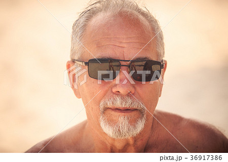 Portrait of Grey Bearded Old Man in Sunglasses Portrait of Grey Bearded Old Man in Sunglasses 36917386