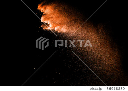 Orange particles explosion on black background. Orange particles explosion on black background. 36918880