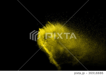 Yellow particles explosion on black background Yellow particles explosion on black background 36918886