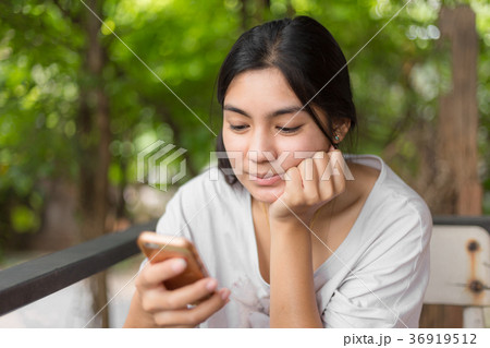 Asian woman in the coffee cafe 36919512