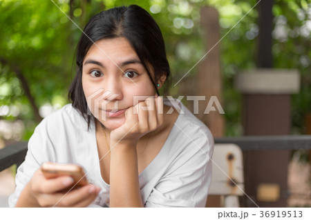 Asian woman in the coffee cafe Asian woman in the coffee cafe 36919513