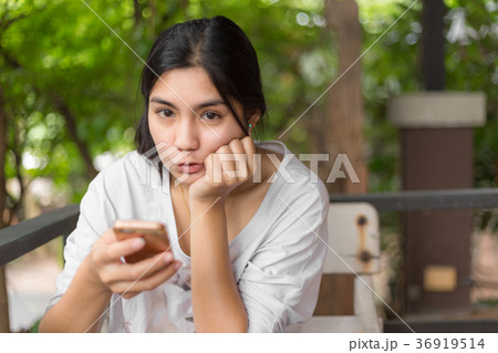 Asian woman in the coffee cafe 36919514