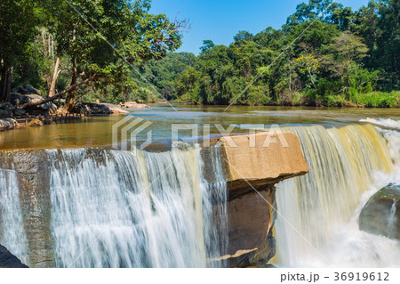 Beautiful waterfall in green forest in jungle Beautiful waterfall in green forest in jungle 36919612