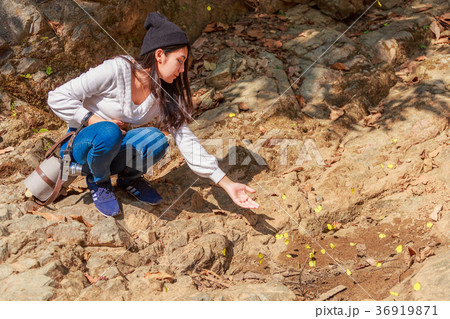 Woman hiking around mountains near the river 36919871