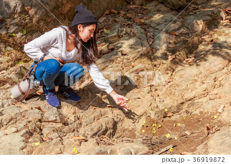 Woman hiking around mountains near the river 36919872
