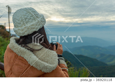Photographer taking photo of landscape Photographer taking photo of landscape 36920118