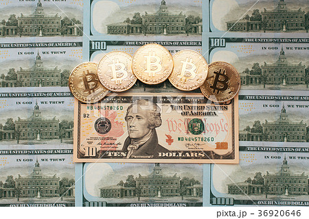 Coins bitcoin, there are money, on table a bill of 36920646