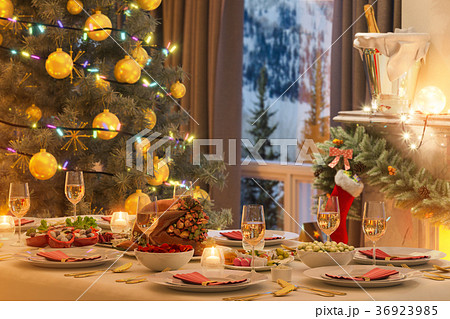 3d illustration of a Christmas family dinner table 3d illustration of a Christmas family dinner table 36923985