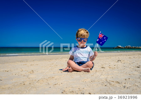 Cute child with Australian flag on Australia day Cute child with Australian flag on Australia day 36923996