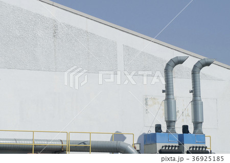 Many air blower located next to factory 36925185