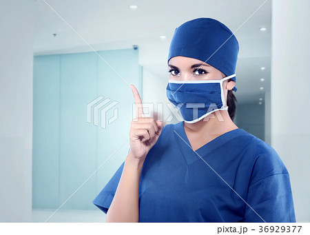 Beautiful asian nurse with medical mask Beautiful asian nurse with medical mask 36929377