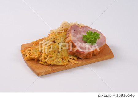smoked pork with potato pancakes and sauerkraut 36930540
