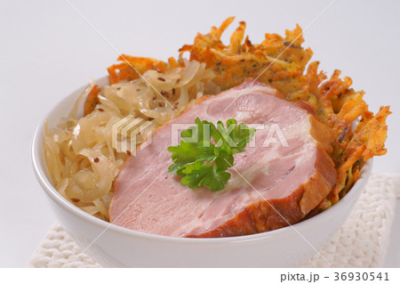 smoked pork with potato pancakes and sauerkraut 36930541