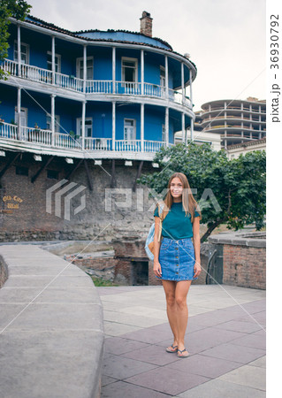 Beautiful young woman on the bridge of peace in Beautiful young woman on the bridge of peace in 36930792