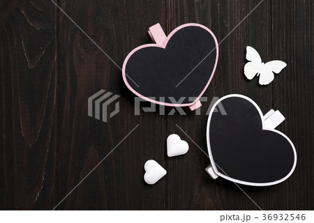 two wooden hearts with butterfly on wooden two wooden hearts with butterfly on wooden 36932546