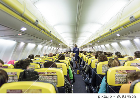 Interior of commercial airplane during flight. Interior of commercial airplane during flight. 36934858