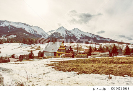 Folk architecture in Zdiar village with Tatry Folk architecture in Zdiar village with Tatry 36935663