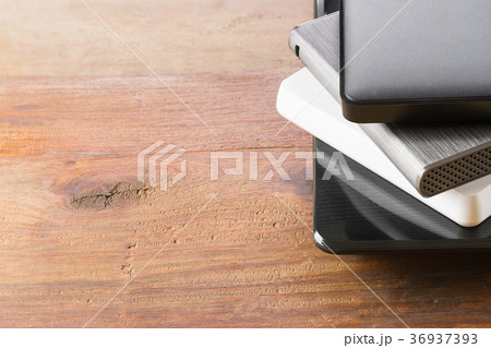 stack of portable external hard drive stack of portable external hard drive 36937393