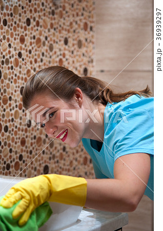 Charming woman doing cleaning 36939297
