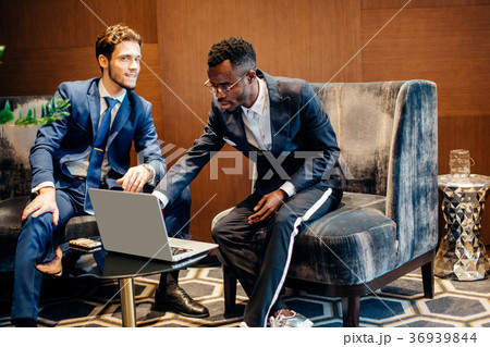 businessman using laptop to discuss information 36939844