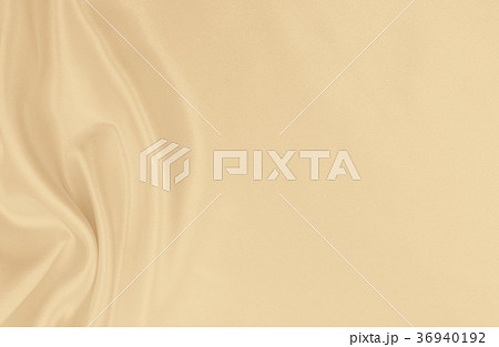 Smooth elegant golden silk or satin luxury cloth Smooth elegant golden silk or satin luxury cloth 36940192