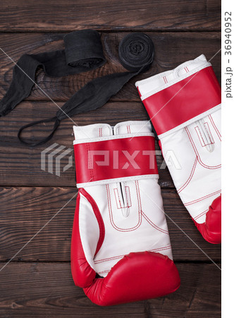 pair of boxing gloves and black bandage 36940952