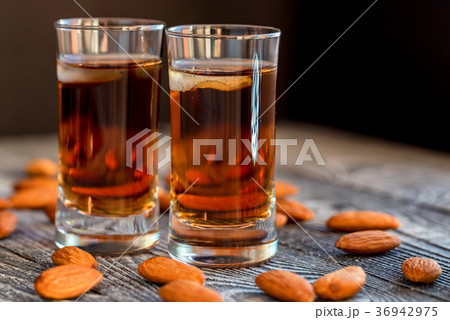 Italian amaretto liqueur with dry almonds 36942975