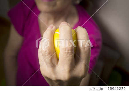 Senior woman doing exercises with a ball Senior woman doing exercises with a ball 36943272