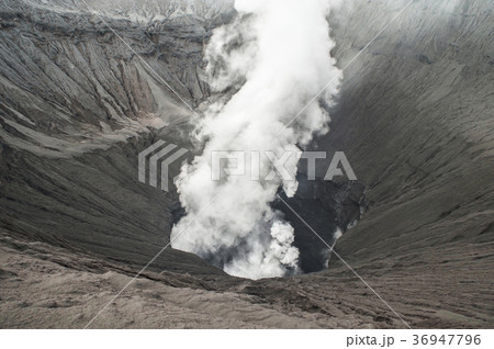 Closeup volcano crater erupting 36947796