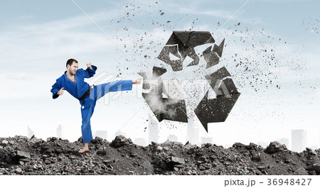 Karate man in blue kimino 36948427