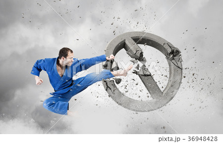 Karate man in blue kimino 36948428