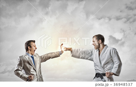 Karate man in white kimino Karate man in white kimino 36948537