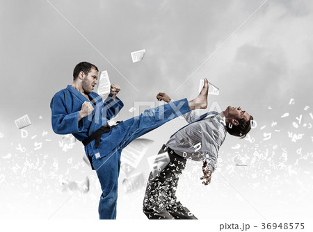 Karate man in blue kimino 36948575