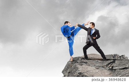 Karate man in blue kimino 36948628