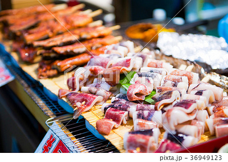 Fresh squid on wooden skewer 36949123