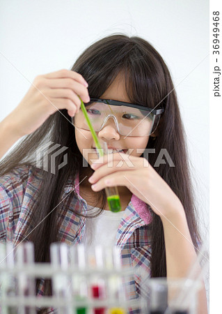 Little Asian girl making science experiment 36949468