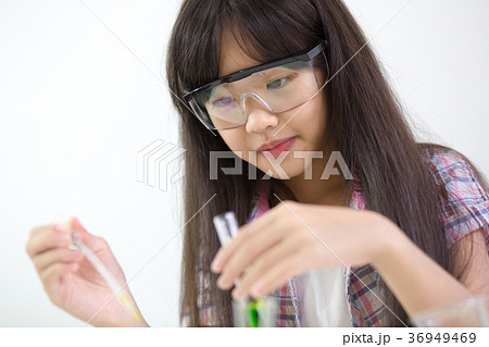 Little Asian girl making science experiment 36949469