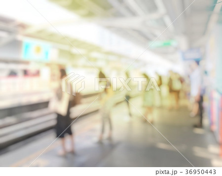 Abstract blurred image of people standing in lines 36950443