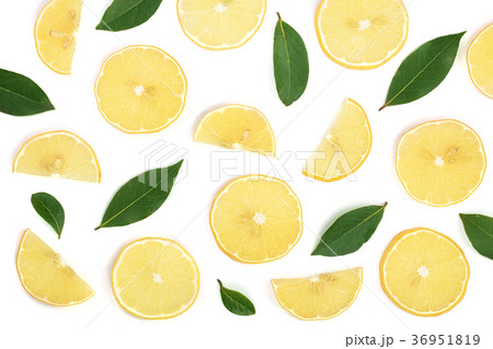 Slices lemon with leaves isolated on white 36951819