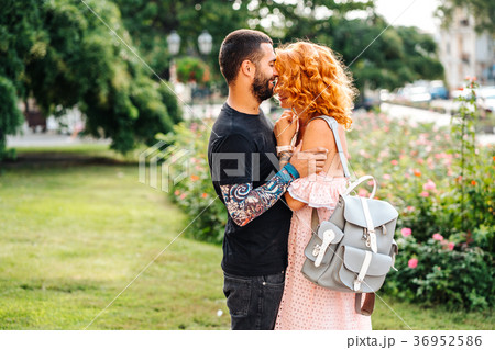Cute couple in summer park Cute couple in summer park 36952586