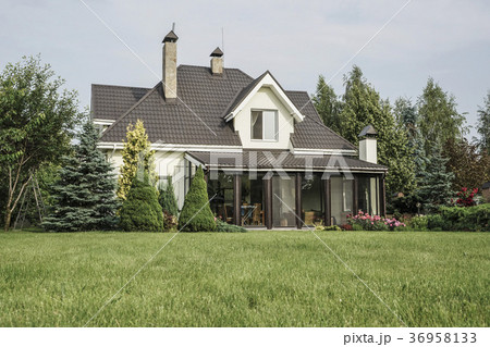 private house and its garden under beautiful sky private house and its garden under beautiful sky 36958133
