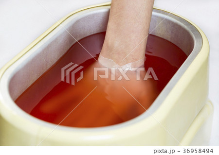 Process paraffin treatment of female hands in beau 36958494