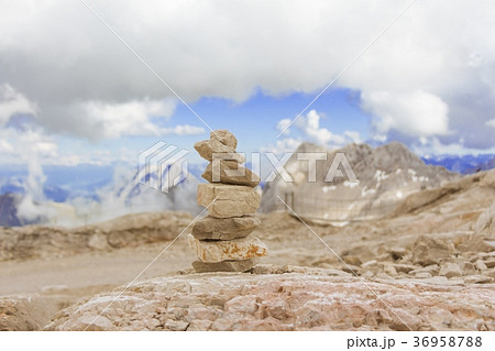 Stone tower in mountains height show balance power 36958788